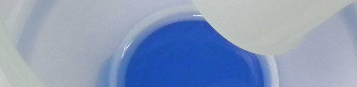 Life Sciences - Abstract image of pot of blue liquid silicone